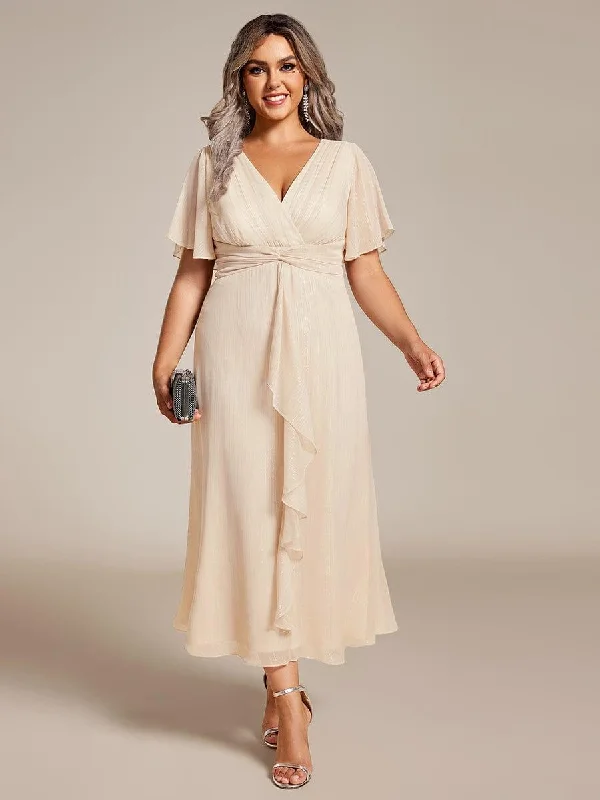Wedding dresses with a dropped waist for a retro style​ Animal - print wedding guest dresses in subtle colors for a bold statement pretty OPAHL|Plus Size Silver Metallic Fabric V-Neck A-Line Wedding Guest Dress featuring Delicate Ruffled Hem