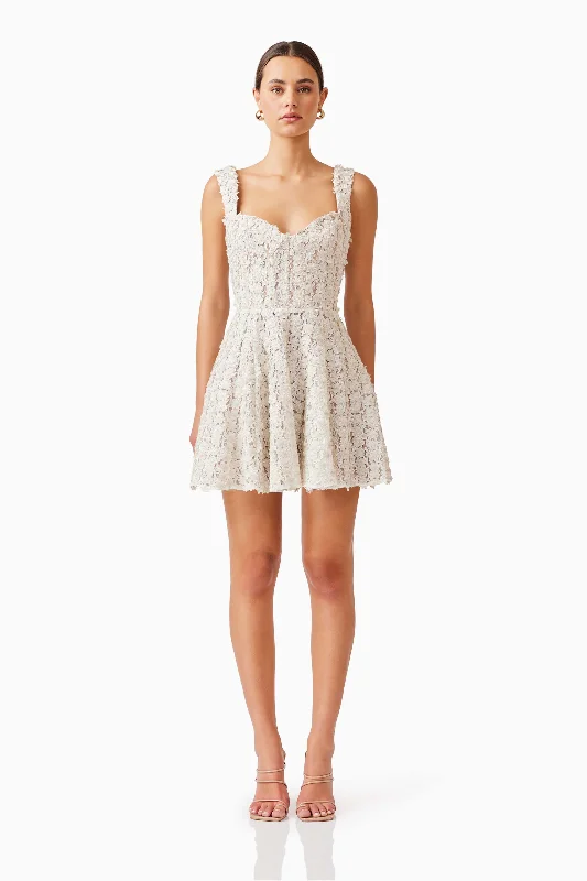 Mini dresses with pom - pom trims for a playful feel Cali Corset Mini Dress in White