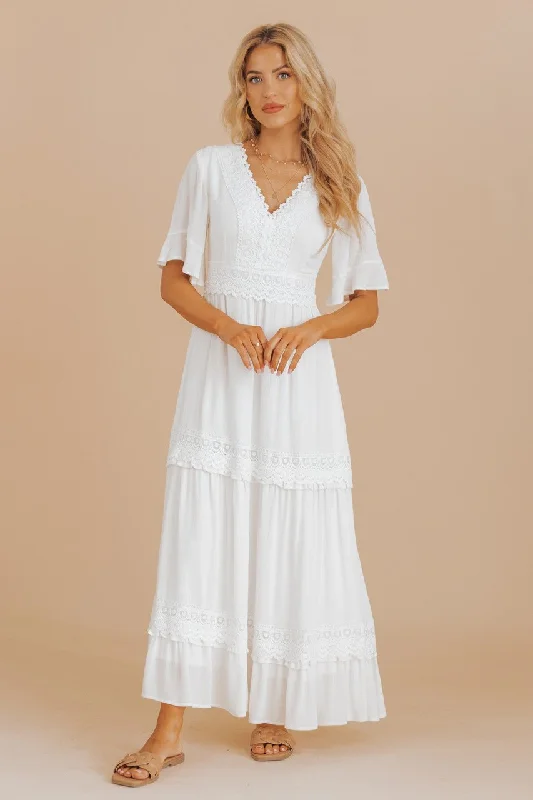 Wedding dresses with a sweetheart - neck and a corseted back​ Wedding guest dresses with gathered skirts and V - necklines White Short Sleeve Lace Maxi Dress