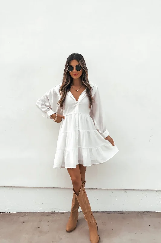 Wedding dresses with a corseted bodice for a cinched waist​ Satin wedding guest dresses with side slits for a sexy touch White Balloon Sleeve Tiered Mini Dress