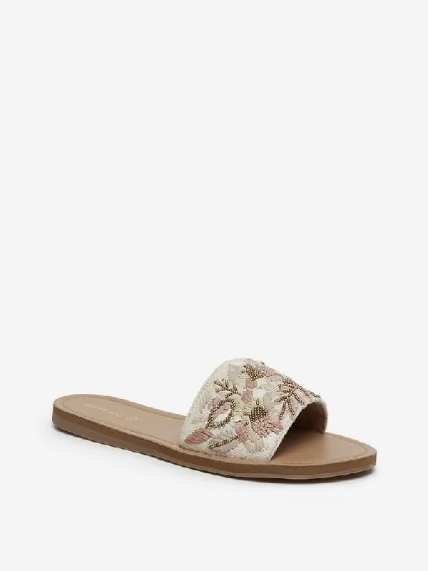 Leather Look Women Shorts for an Edgy and Chic StyleLUNA BLU Beige Raffia Floral Pattern Slides Leather Look Women Shorts for an Edgy and Chic StyleLUNA BLU Beige Raffia Floral Pattern Slides