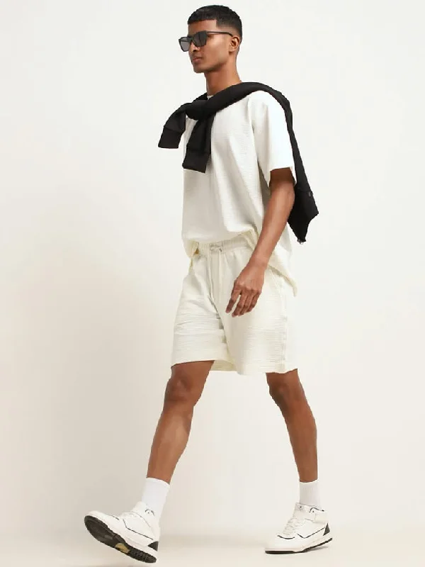 Cuffed Women Shorts for a Laid - Back and Trendy LookStudiofit Off-White Cotton Blend Relaxed Fit Bermuda Shorts